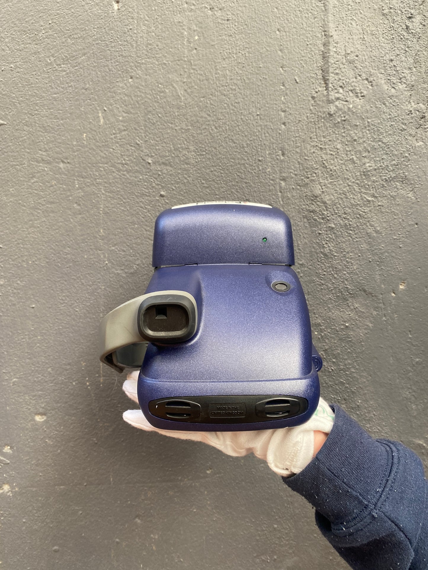 Blue Polaroid 600 close up instant camera