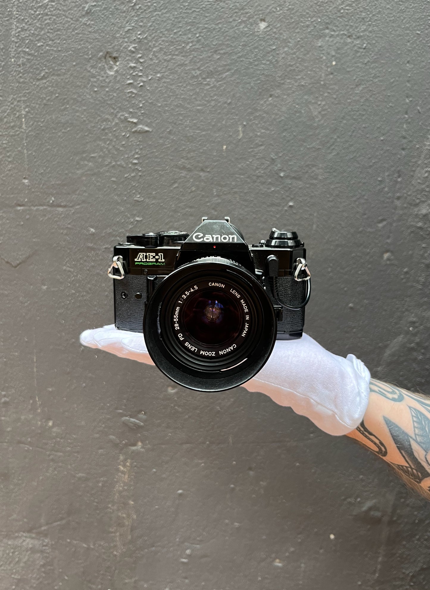 Canon AE-1 Program SLR Camera with Canon FD 28-55mm f/3.5-4.5 Zoom Lens - 1272824H
