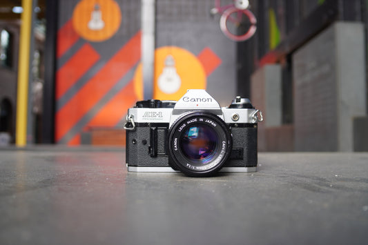 Canon AE-1 Program SLR Camera with Canon FD 50mm f/1.4 Lens – 1012903