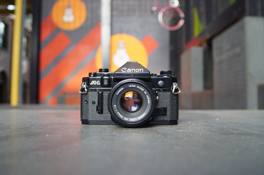 Canon A-1 SLR Camera with Canon FD 50mm f/1.8 Lens – 1367312