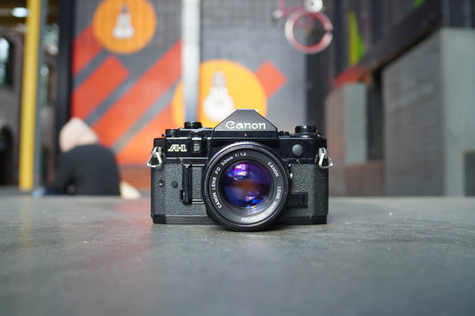 Canon A-1 SLR Camera with Canon FD 50mm f/1.4 Lens – 1076737