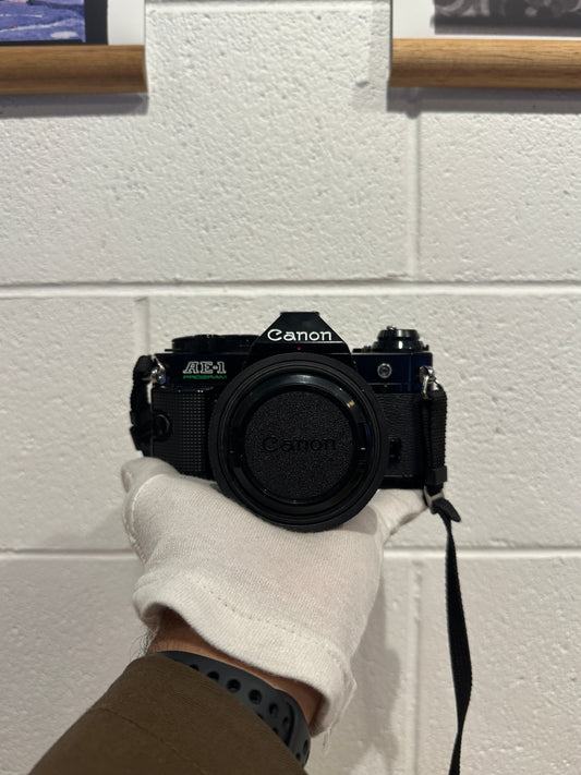 Canon AE-1 Program 35mm SLR Camera with Canon FD 50mm f/1.8 Lens - 2367929