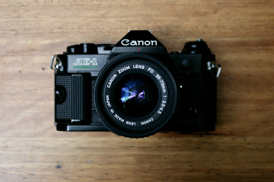 Canon AE-1 Program SLR Camera Body and 35-70mm Zoom Lens– 262142