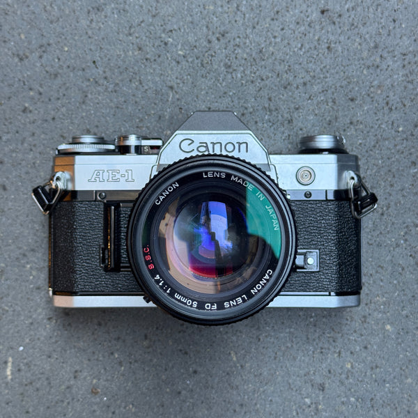 Canon AE-1 SLR Camera with Canon FD 50mm f/1.4 Lens – 5567551