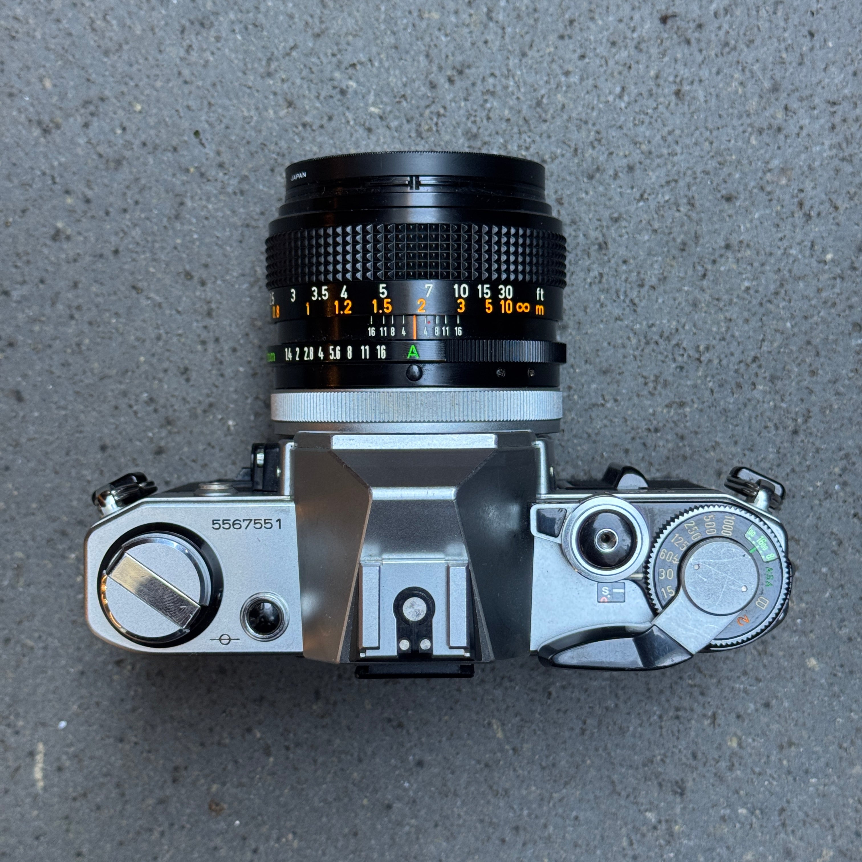 Canon AE-1 SLR Camera with Canon FD 50mm f/1.4 Lens – 5567551
