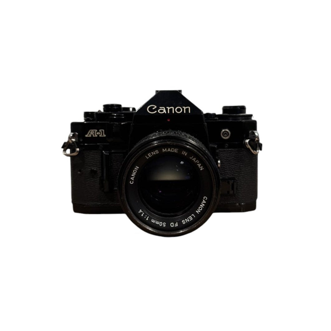 Canon A-1 SLR with Canon FD 50mm f/1.4 Lens - 1578509